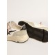 Running Sole with gray suede inserts and black glitter star